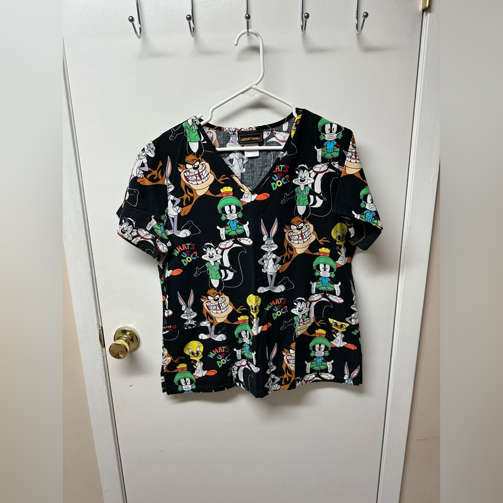 Women’s scrub top, excellent condition.